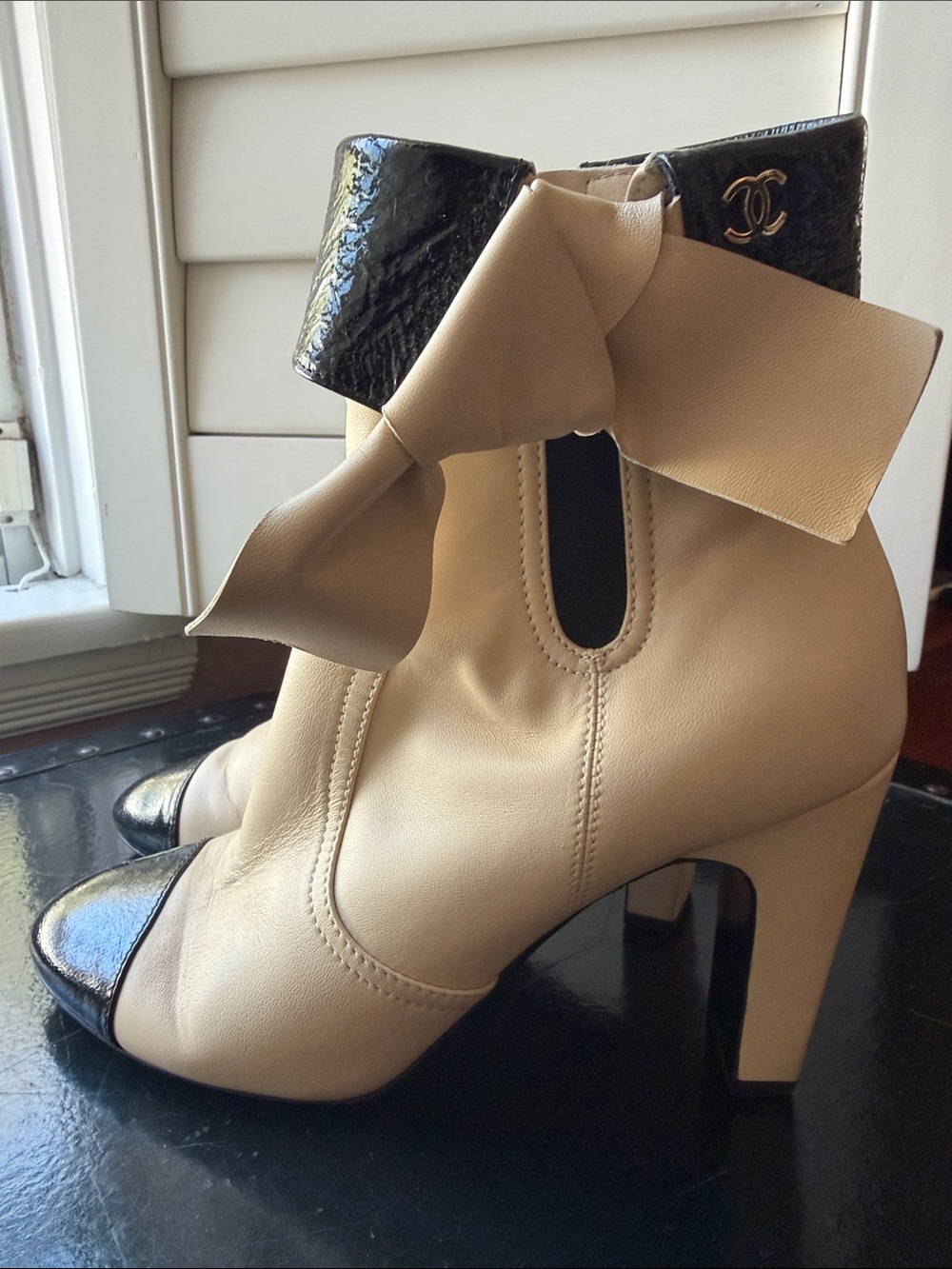 CHANEL Beige and Black Bow Accent Leather Ankle Boots